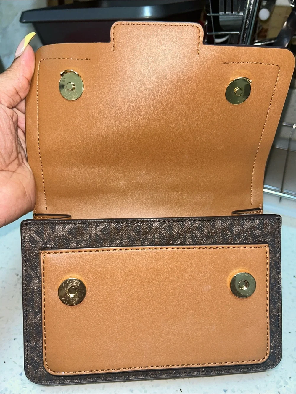 Like new Michael Kors Brown Logo Crossbody with Tan Leather and Gold Chain